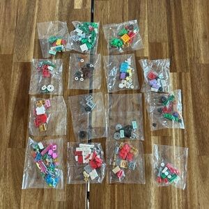Lot of 15 small bags of LEGO pieces. Sealed. NEW